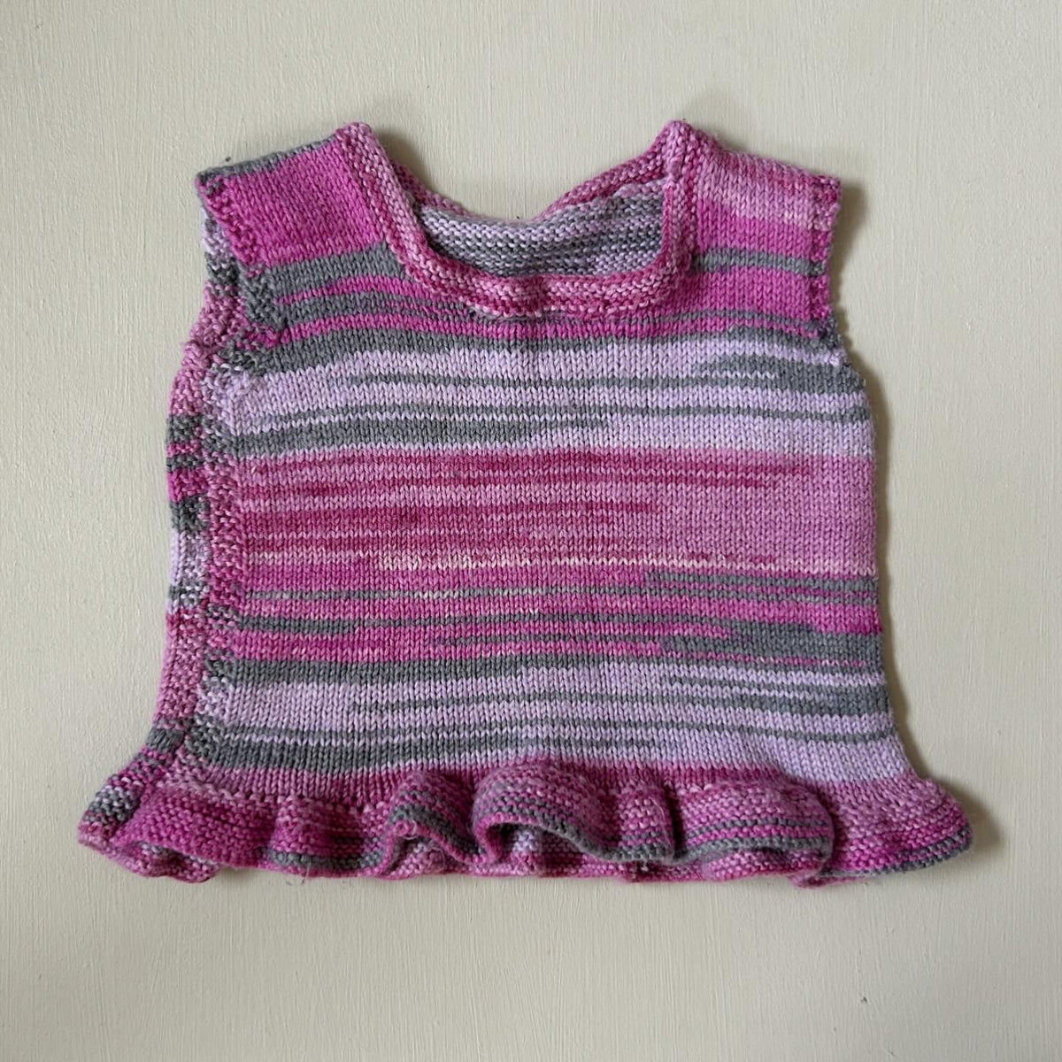 Uldvest med peplum 80/86