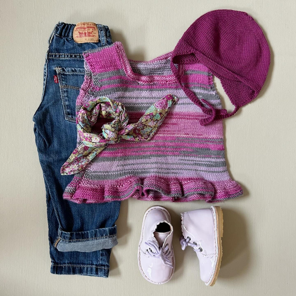 Uldvest med peplum 80/86