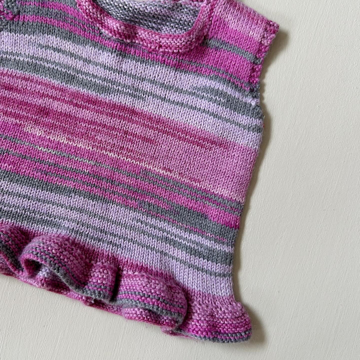 Uldvest med peplum 80/86