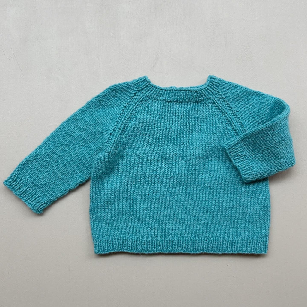 Uldstrik i turkis 80/86