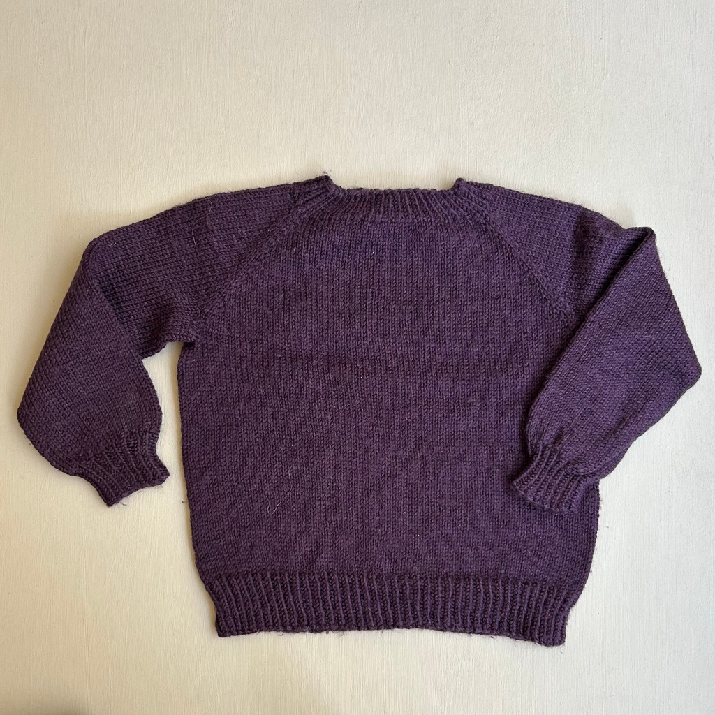 Lilla uldstrik 110/116