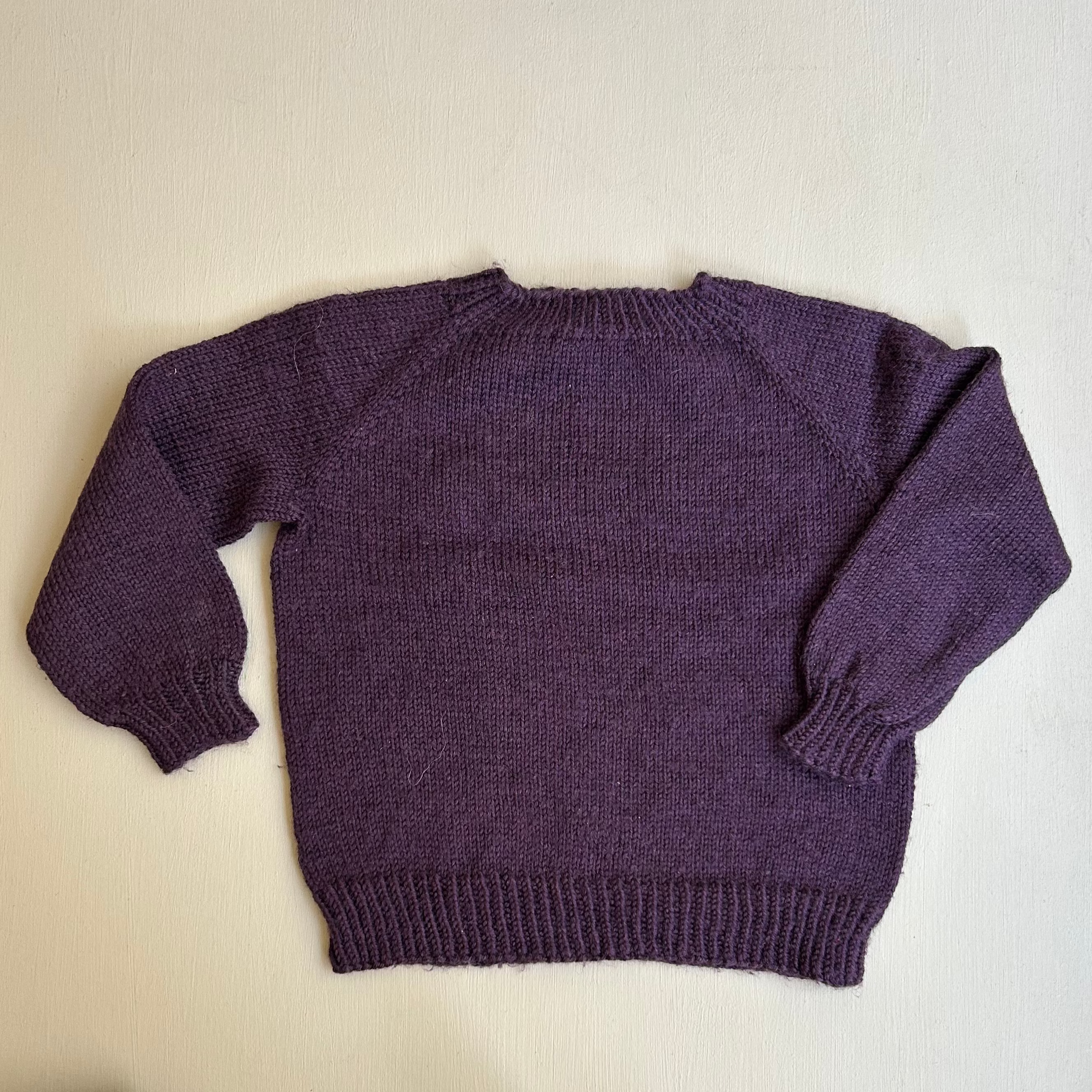 Lilla uldstrik 110/116