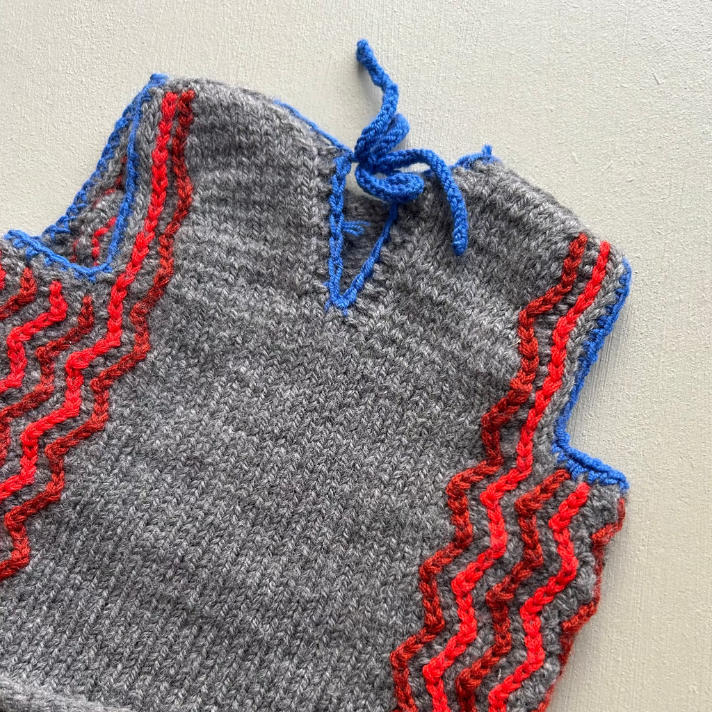 Uldvest med fine detaljer 62/68