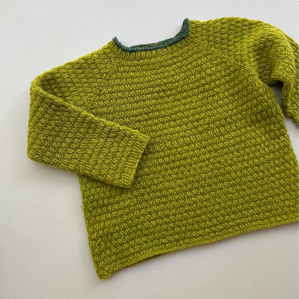 Uldstrik i smuk grøn 92/98